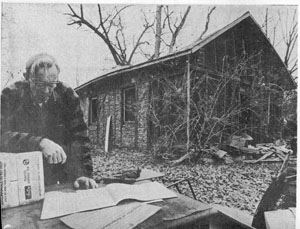 Man Standing in Front of a Structure